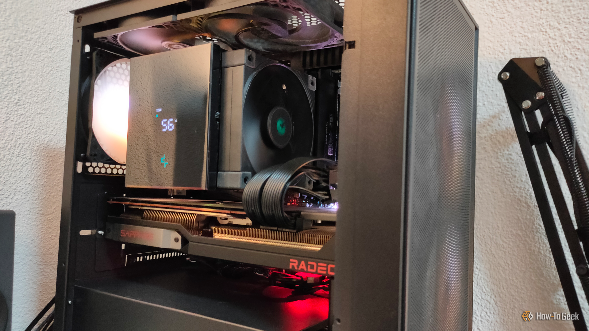 A gaming PC with five cooling fans and a CPU cooler.