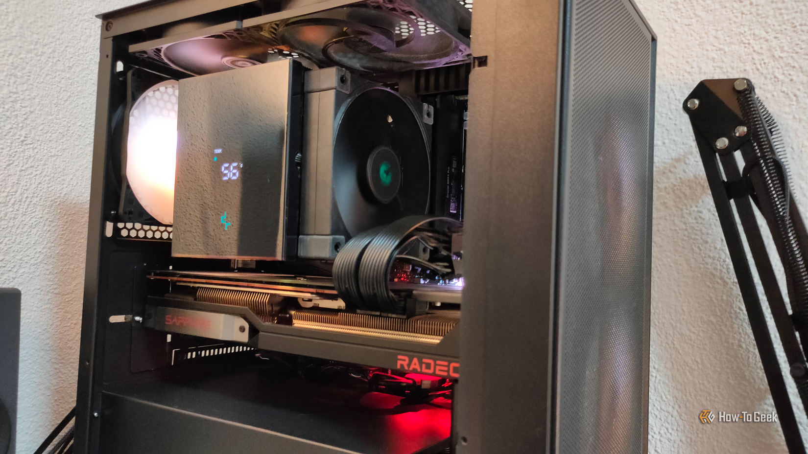 A gaming PC with five cooling fans and a CPU cooler.
