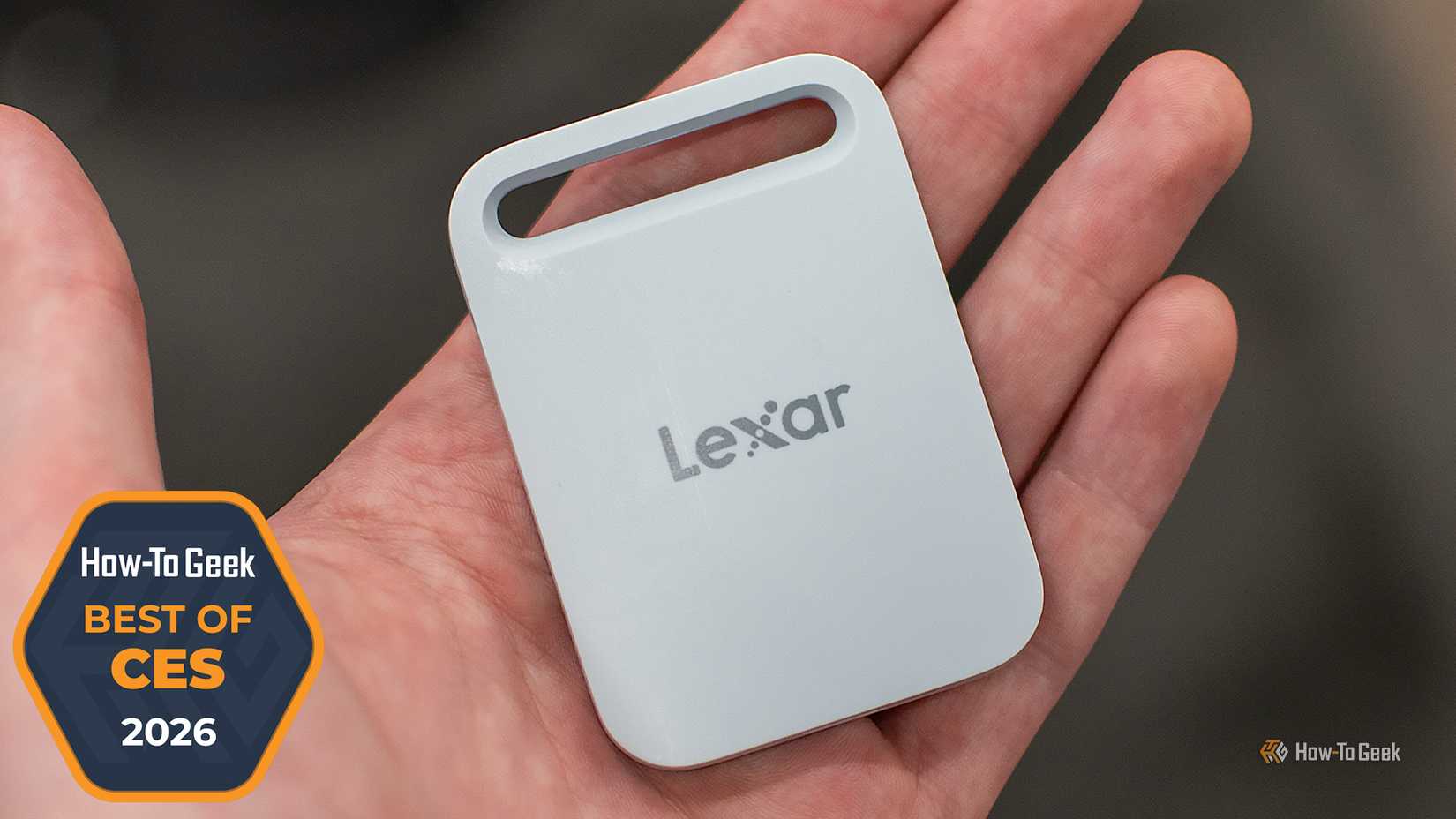 A hand holding the Lexar Air Portable SSD.