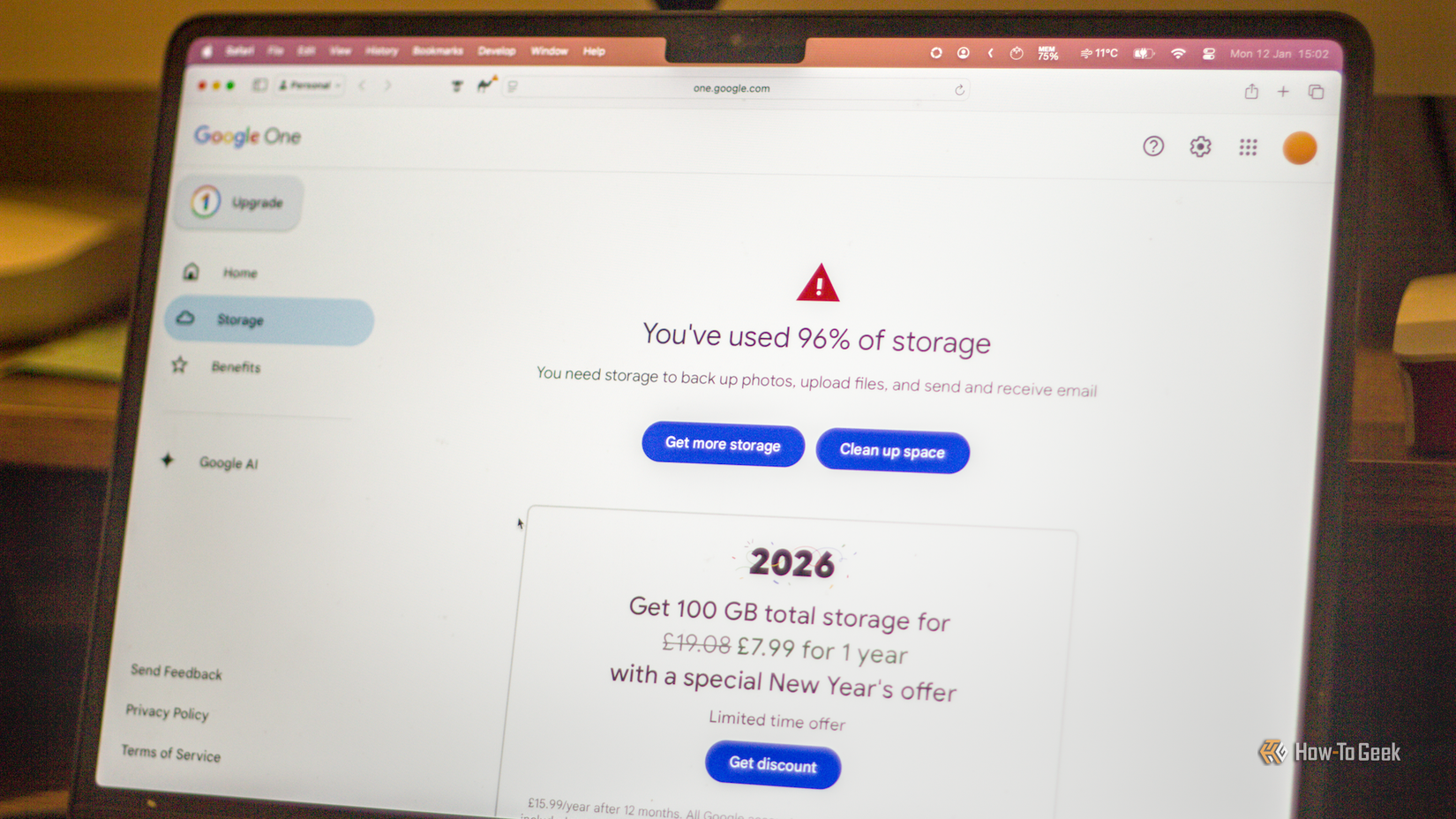 A computer on the Google One storage page showing the account is nearing the free 15GB limit.