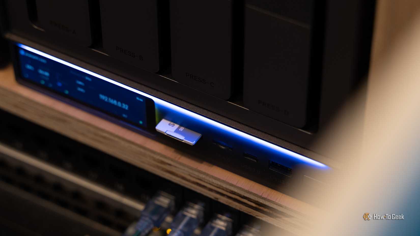 An SD card plugged into the front of the Zettlab D4 NAS.