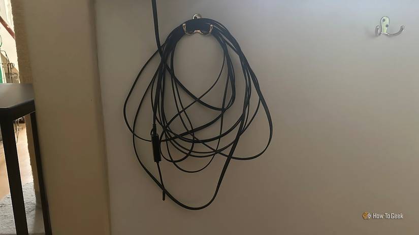 An Ethernet cable spooled around a coat hook.
