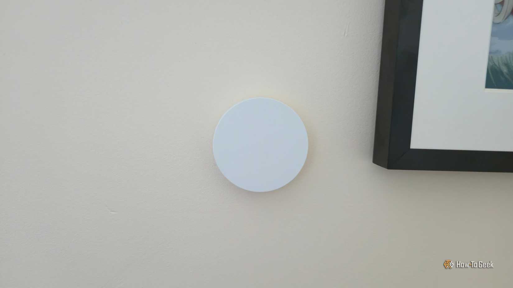 IKEA TIMMERFLOTTE temperature and humidity sensor in a wall.