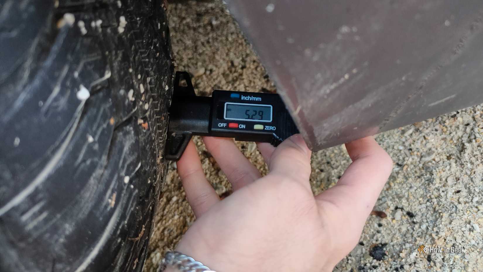 A tire tread depth gauge.