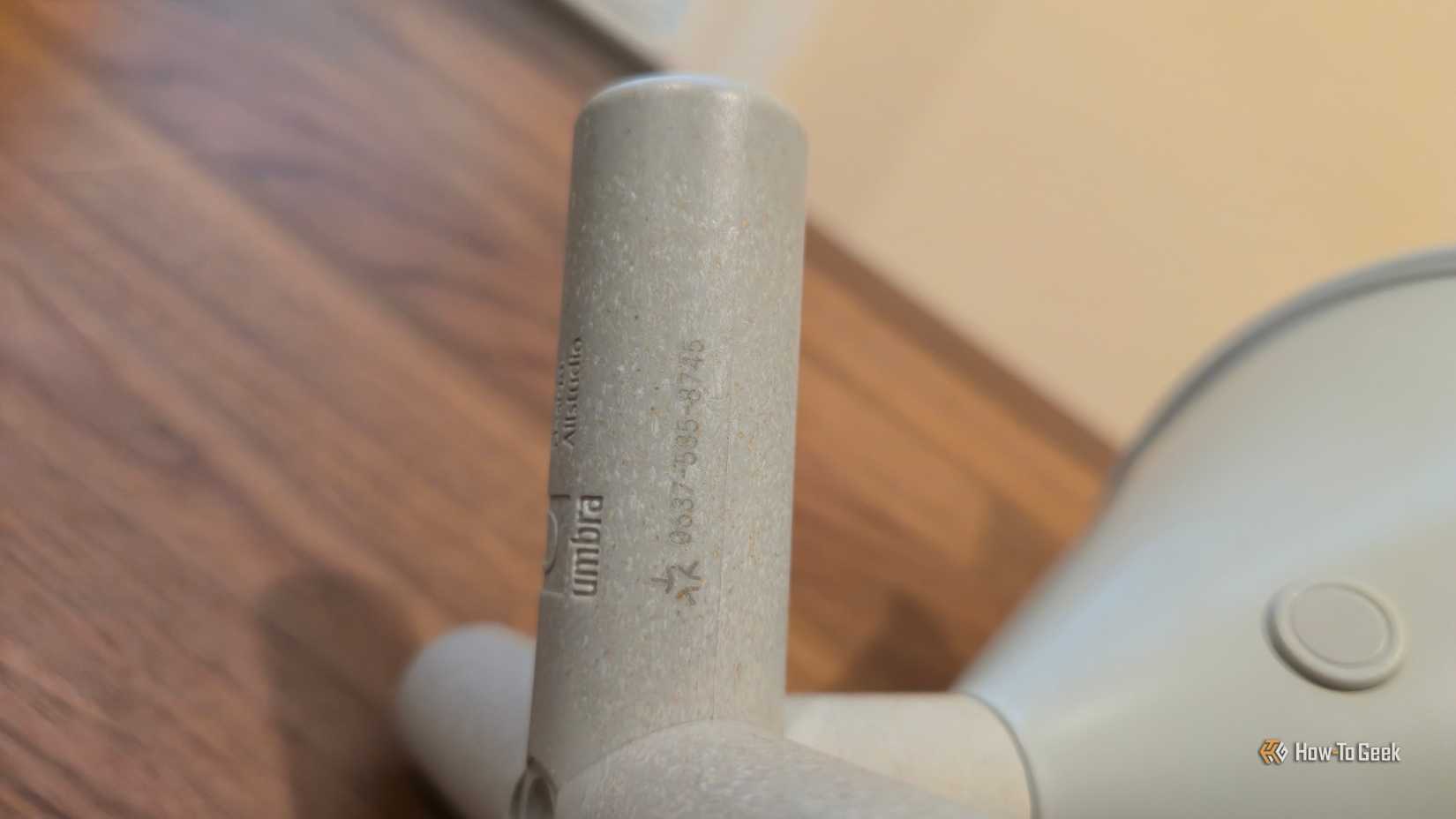 Important pairing code on an Umbra Cono portable smart light.