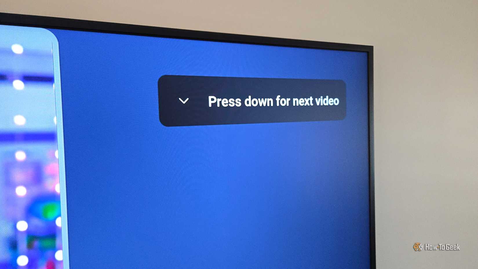 Instructions on how to watch the next vertical video in YouTube.