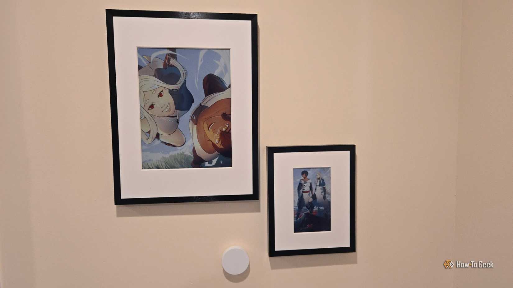 Two SwitchBot AI Art Frames displaying artwork from the video game Haven.-1