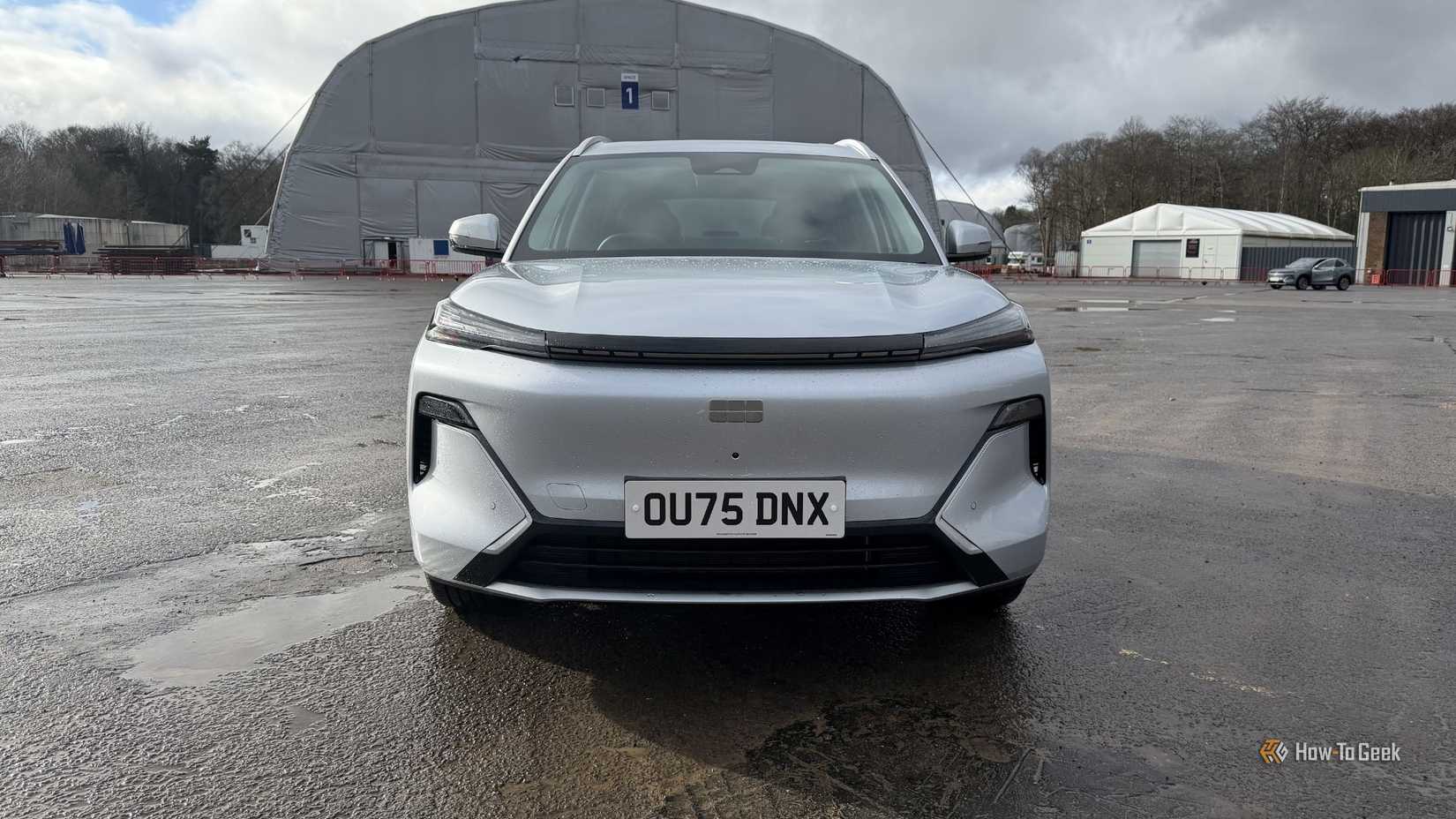 Static front-end shot of a silver 2026 Geely Starray EM-i.