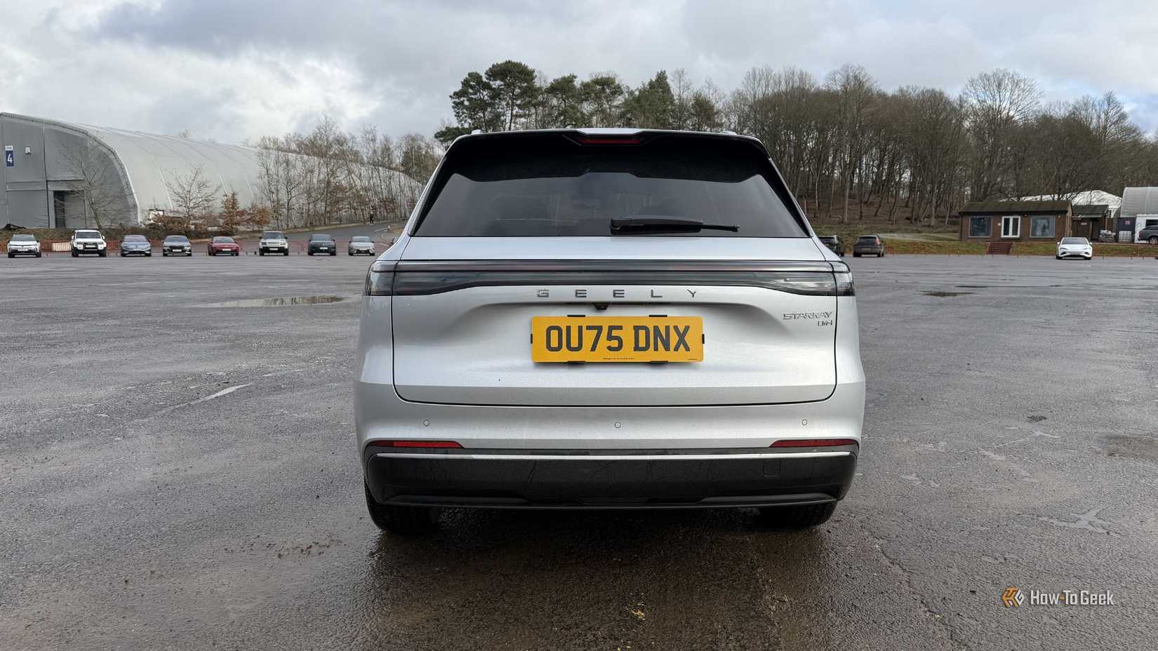 Static rear-end shot of a silver 2026 Geely Starray EM-i.
