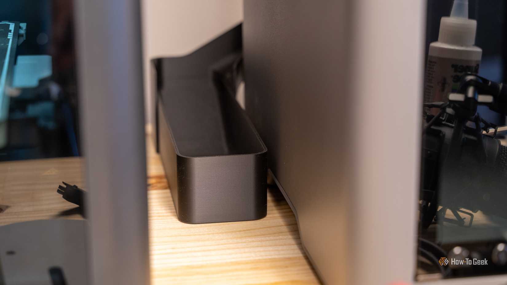 3D printer poop chute coming out of the side of the printer.