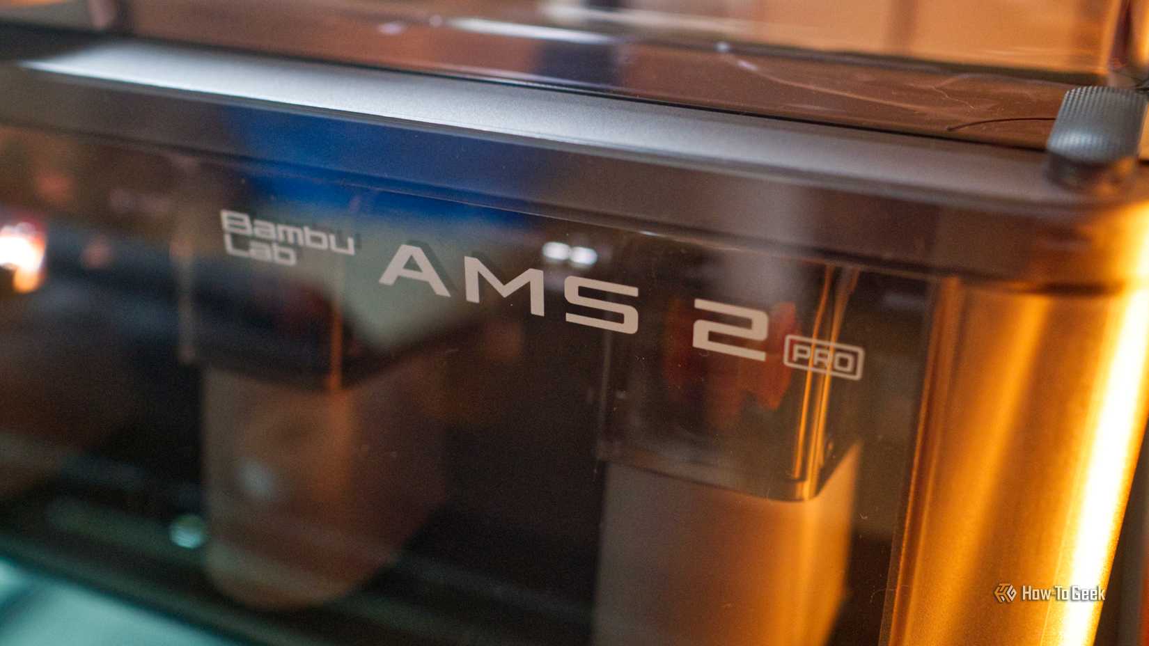 Bambu Lab AMS 2 Pro attached to a P2S 3D printer.