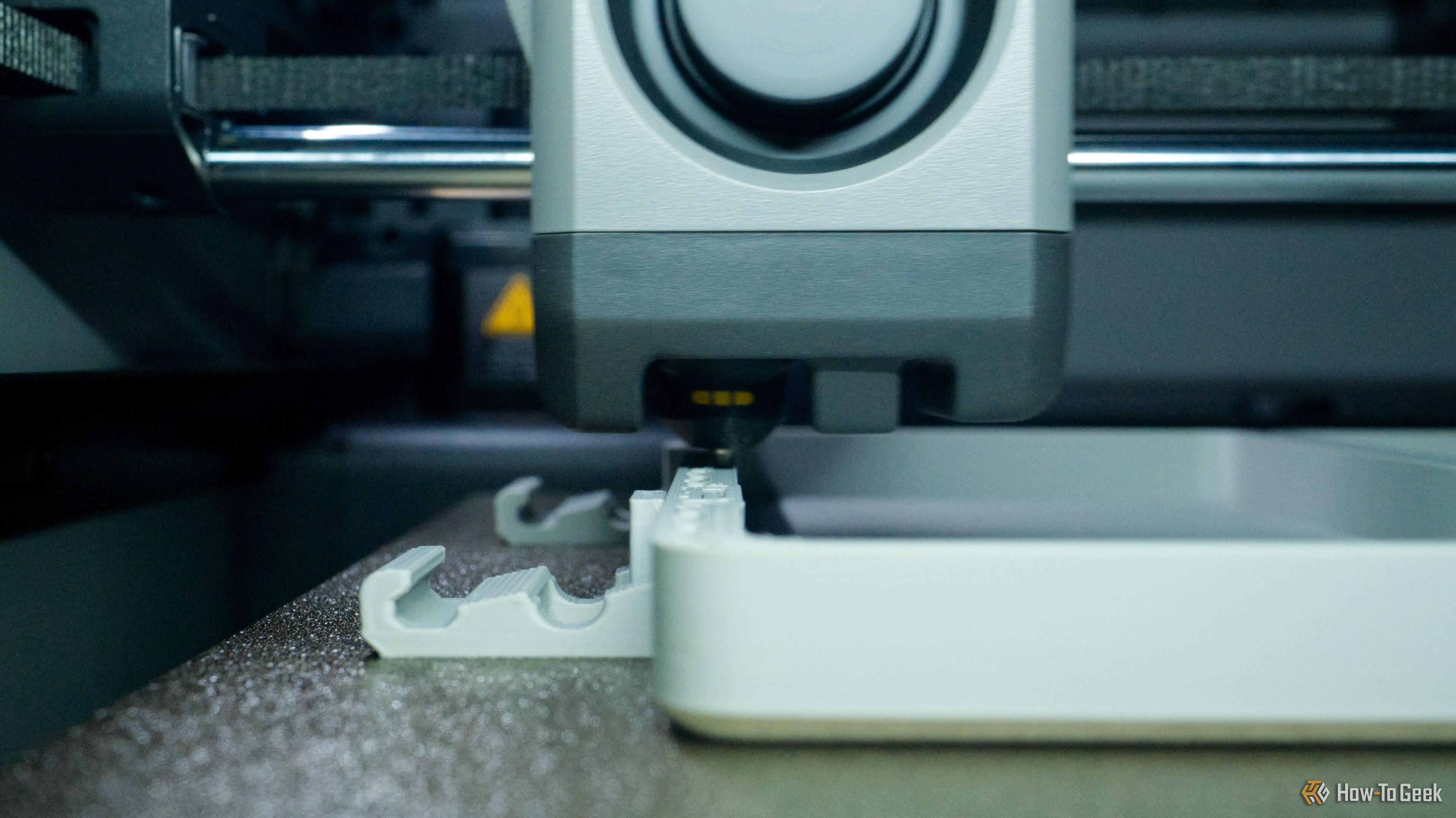 Bambu Lab P2S 3D printer mid-print.