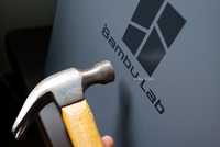 Bambu Lab P2S printer with hammer.