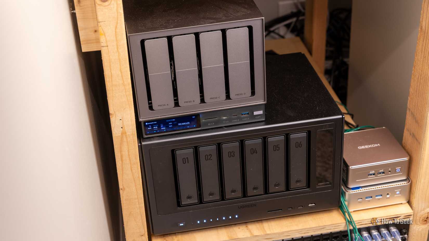 High angle view of the homelab NAS stack and mini PCs.
