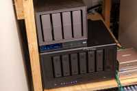 High angle view of the homelab NAS stack and mini PCs.