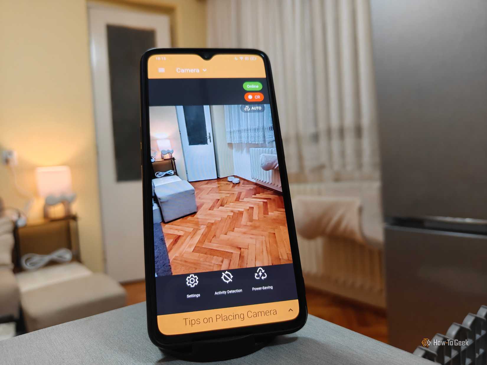 An old phone being used as a security camera.