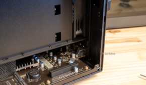 The right side of the Ugreen iDX6011 Pro NAS interior showing PCIe connectors and the motherboard edge.