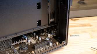 The right side of the Ugreen iDX6011 Pro NAS interior showing PCIe connectors and the motherboard edge.