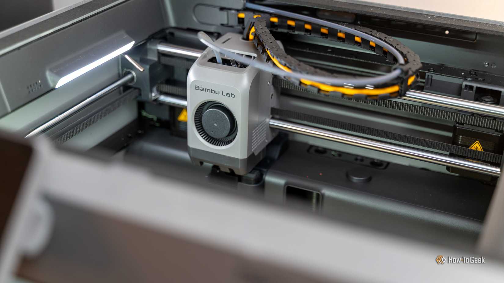 Top-down view of the Bambu Lab print head with PTFE tube connected.