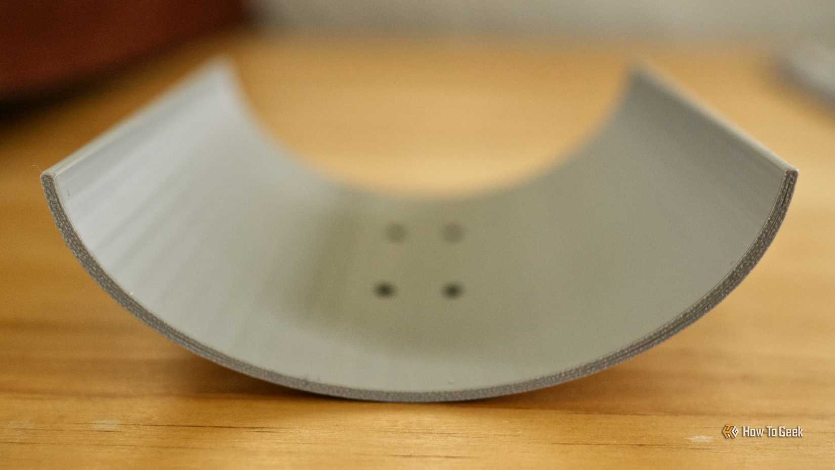 3D printed parabolic Wi-Fi antenna lying on its back.