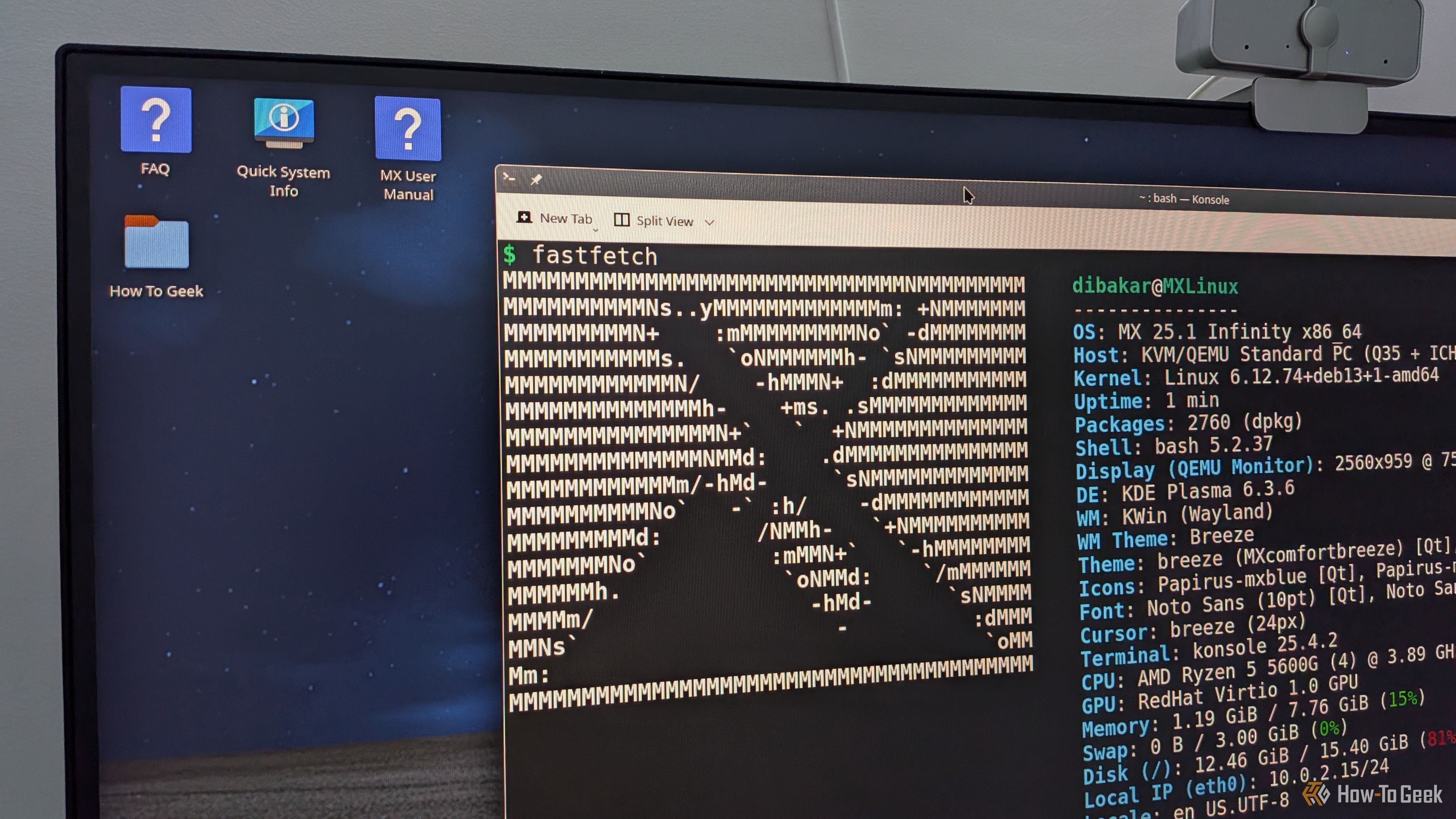 A desktop PC with MX Linux running and Fastfetch showing the MX Logo.