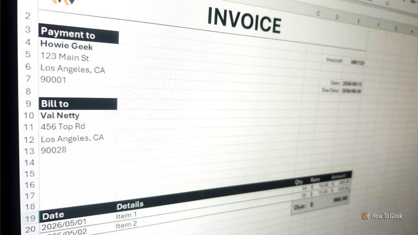 A laptop screen showing an invoice template in Excel.