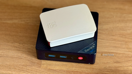 I grew to become a $50 Fb Market mini PC into without equal domestic server A Raspberry Pi in a case lying on top of a Beelink Mini S12 Pro mini PC.