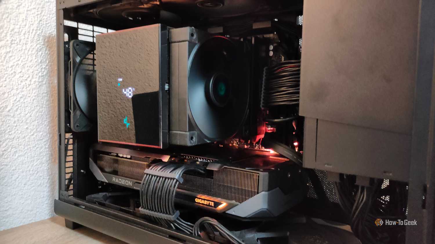 Closeup of an ITX PC tower stuffed with cmoponents.