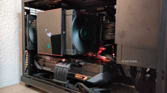 Closeup of an ITX PC tower stuffed with cmoponents.