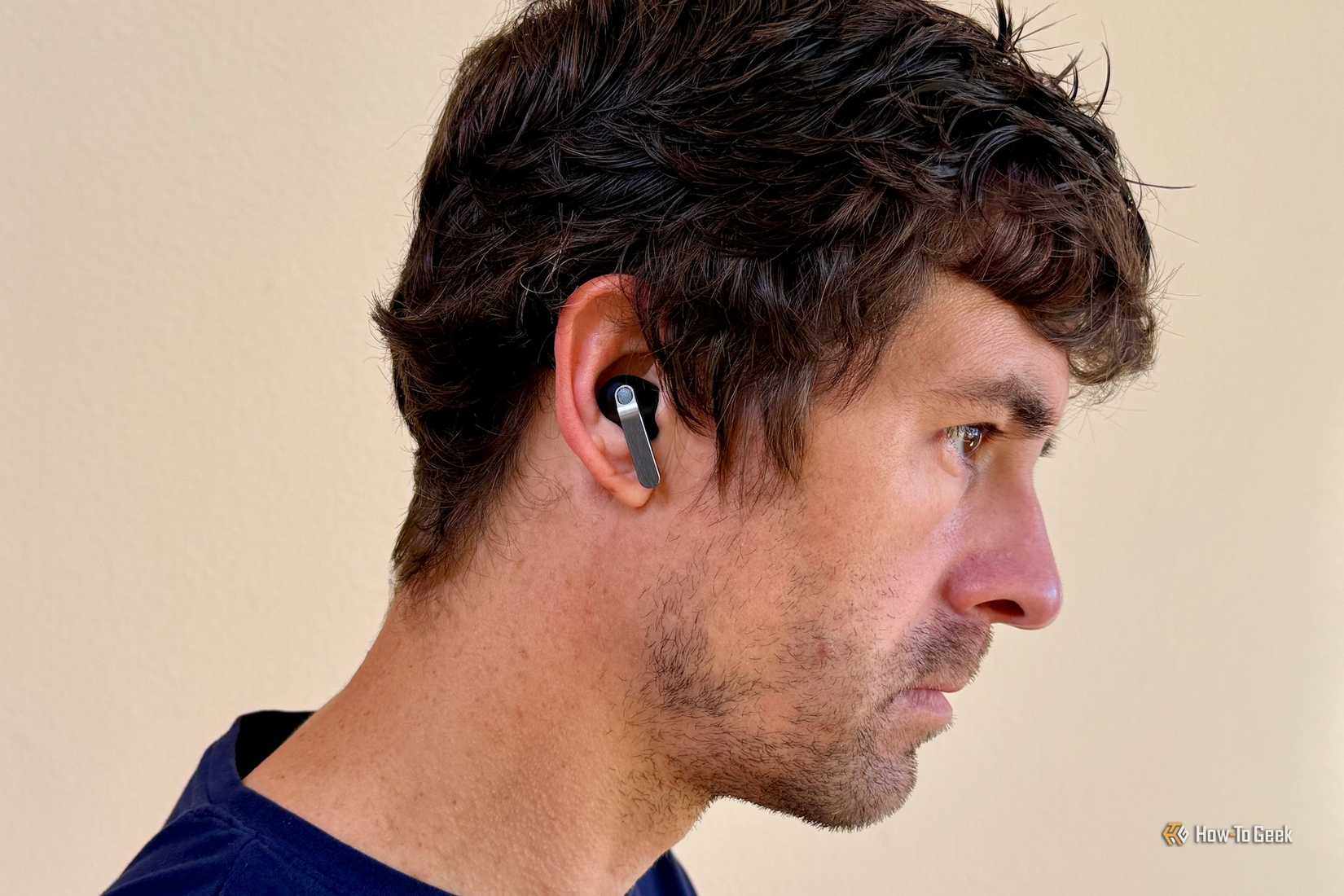 Samsung Glaxay Buds4 Pro being worn in-ear.