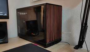 An ITX PC Tower stands on a desk.