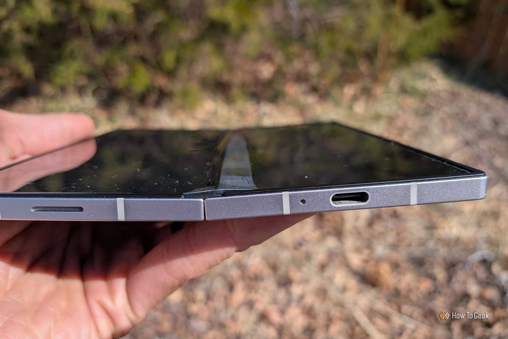 A screen protector that peels off the interior screen of a Samsung Galaxy Z Fold 6.
