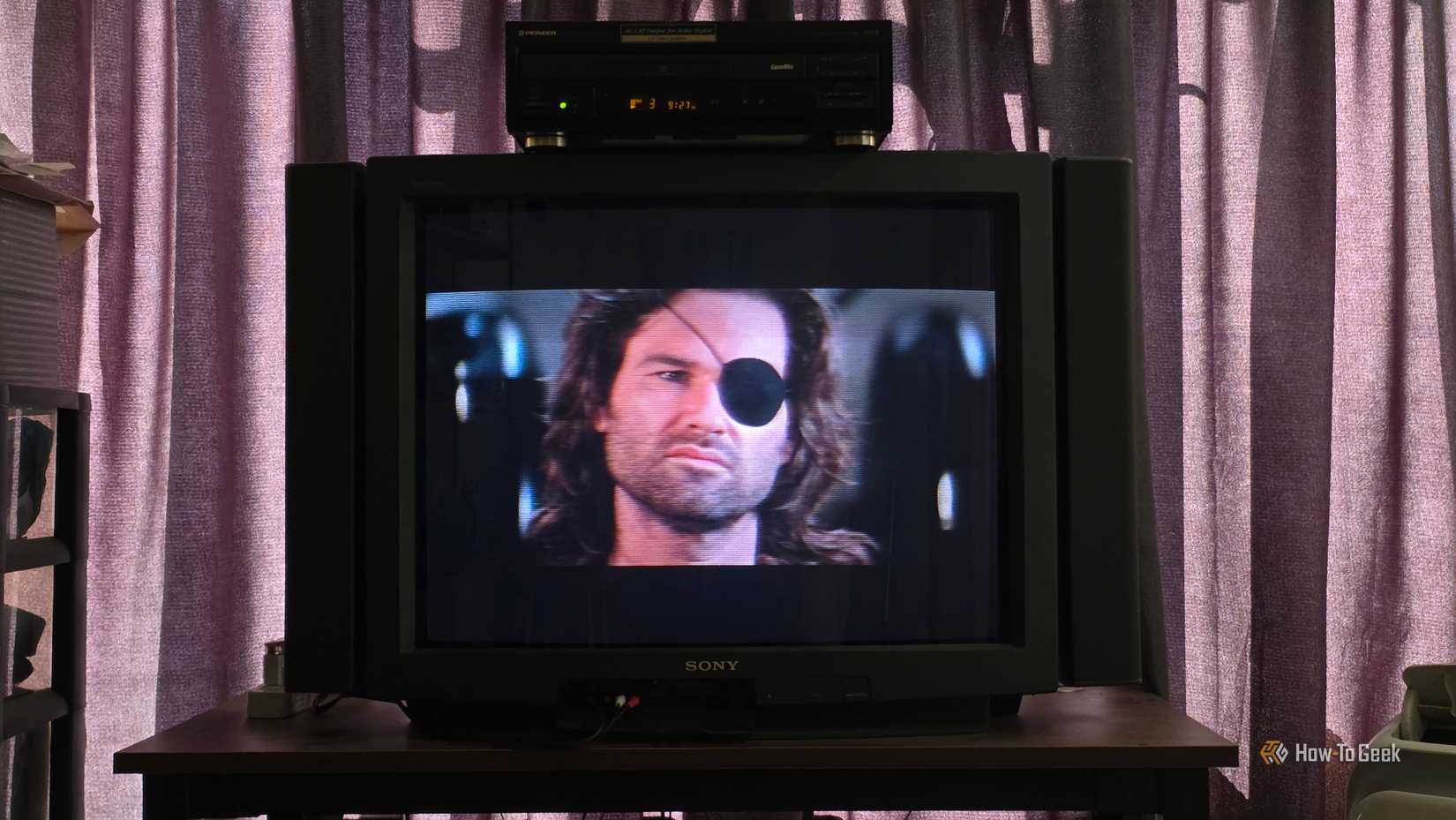 The Escape from LA LaserDisc plays on a Pioneer LaserDisc player placed on top of a Sony Trintiron television.