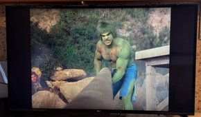 The Incredible Hulk moving a heavy pipe on LG Channels.