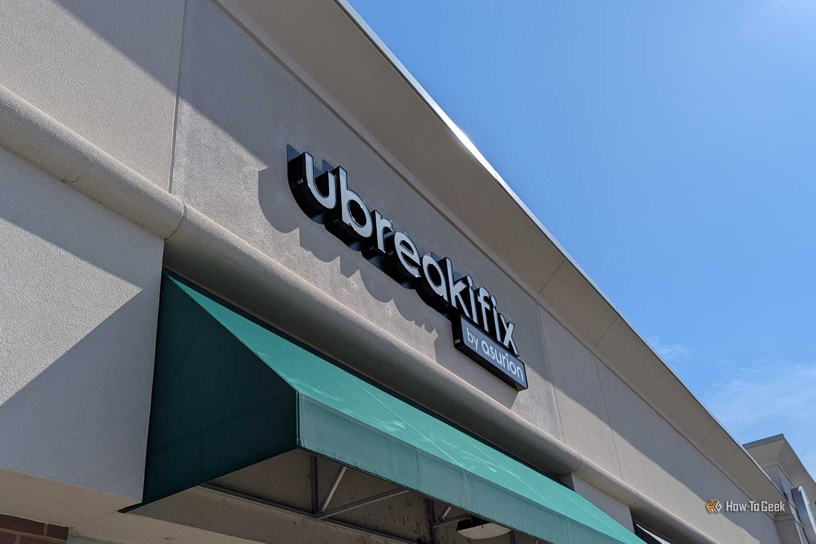 The sign on a UBREakIFix store.