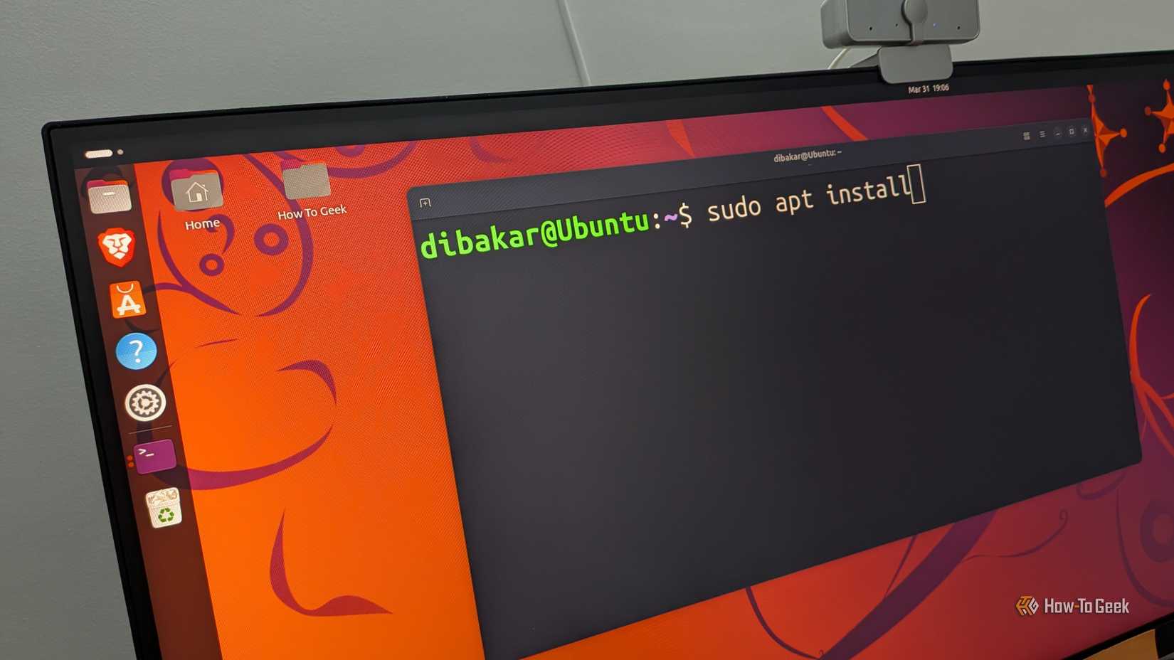 Ubuntu running with a terminal open with sudo apt install written.