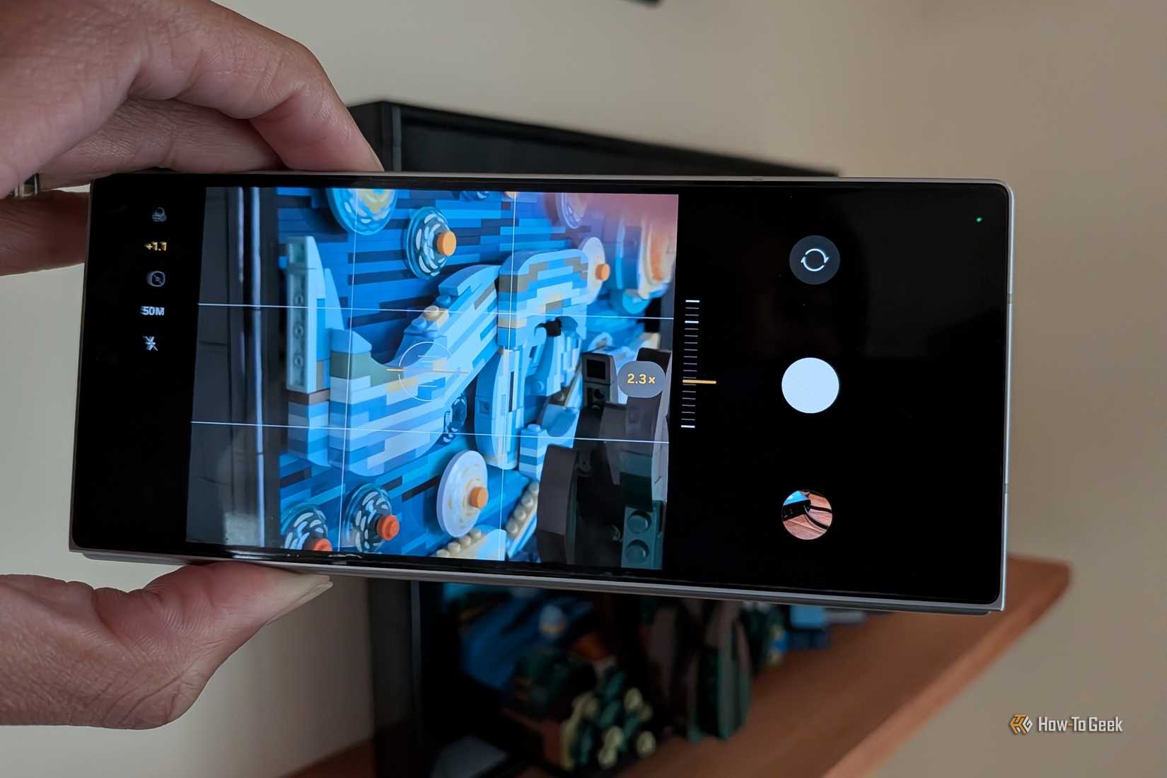 Using volume keys to zoom in the camera app on a Samsung Galaxy Z Fold 6.