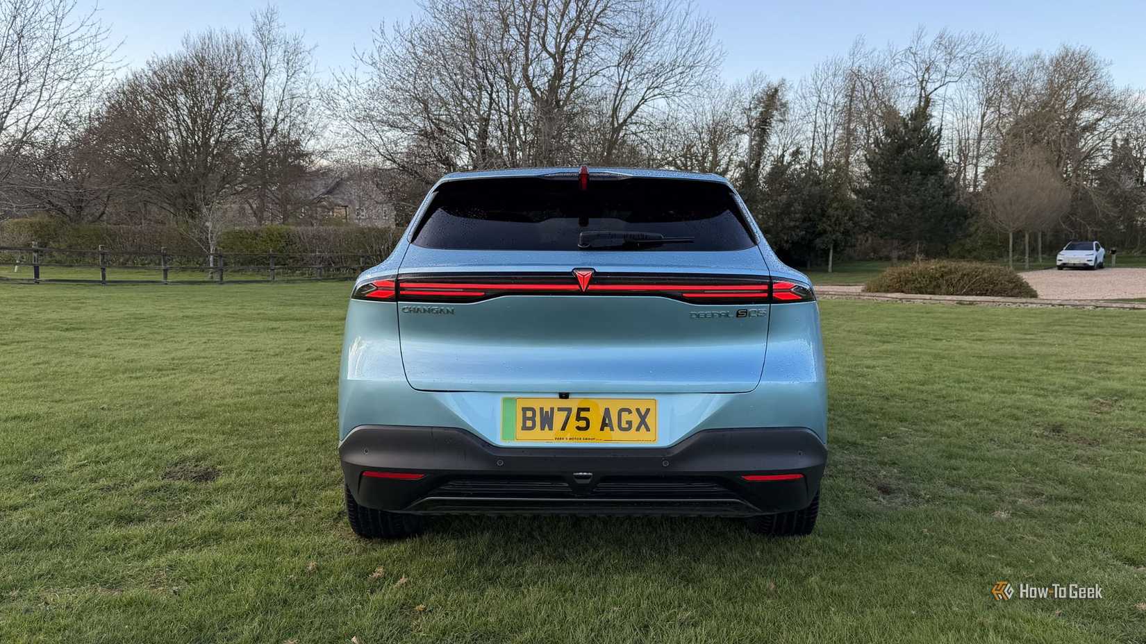 Static rear-end shot of a blue 2026 Changan Deepal S05.