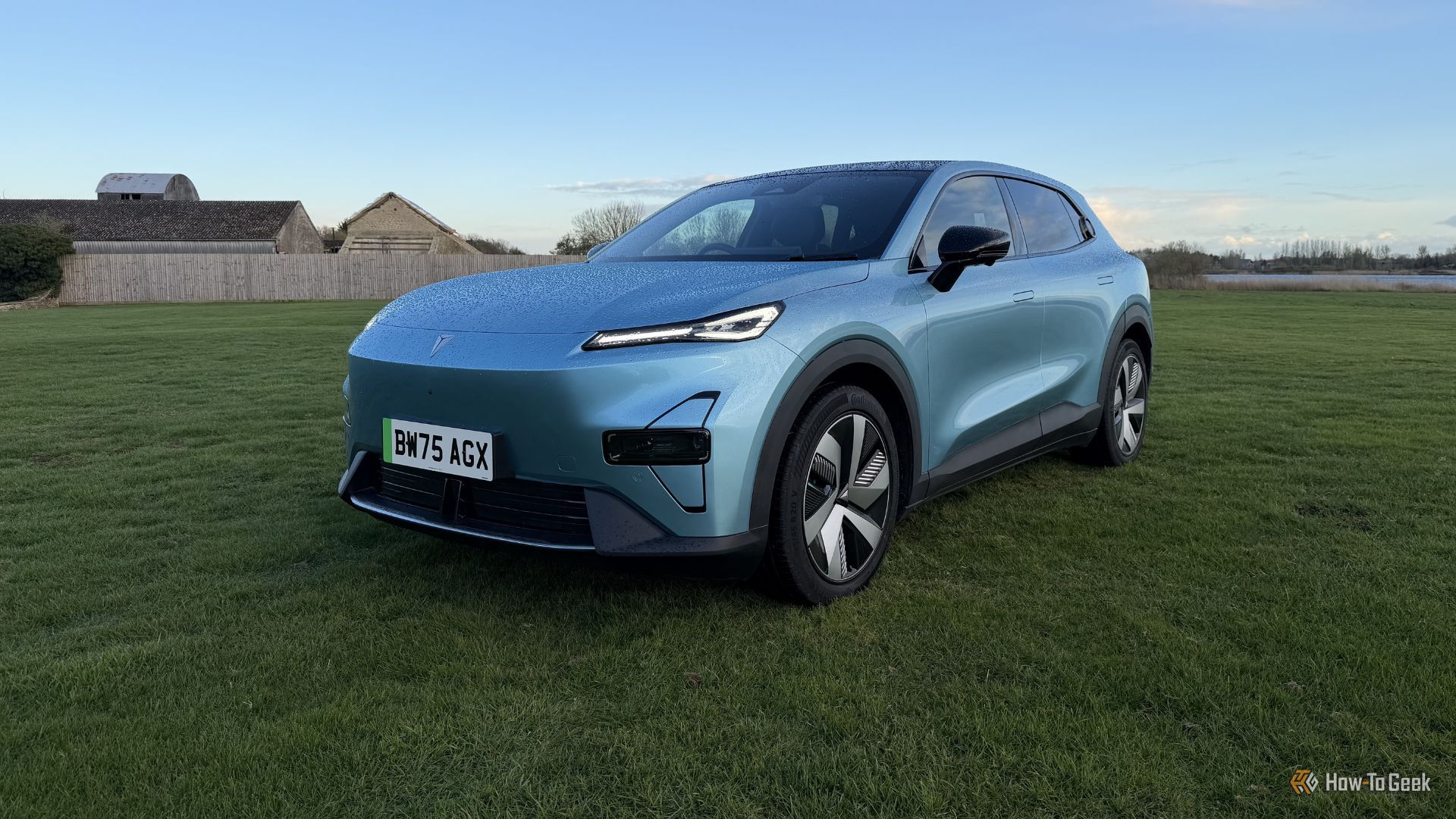 Static front 3/4 shot of a blue 2026 Changan Deepal S05.