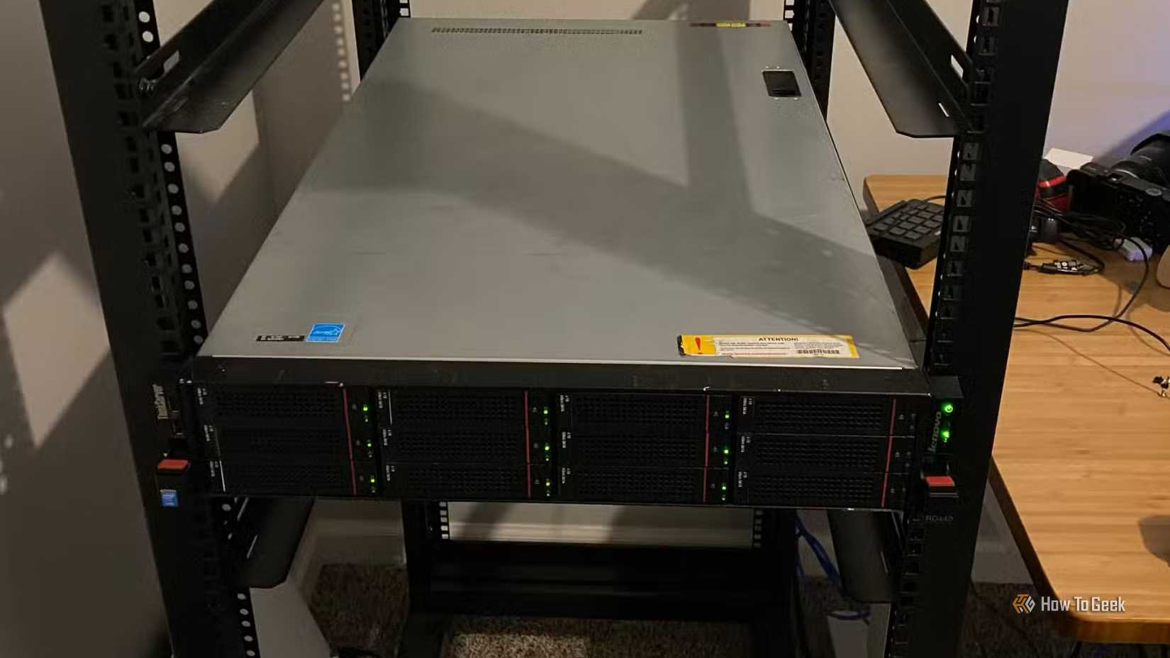 A Lenovo RD440 rack-mount server mounted to a 27U rack in a homelab.