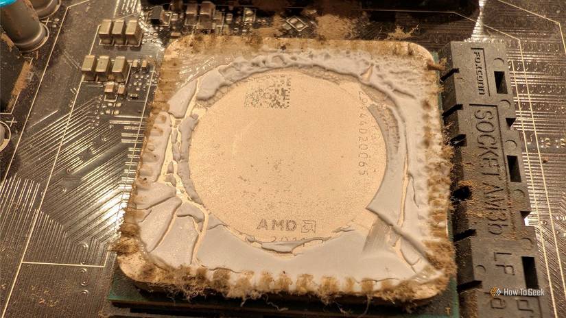 Dirty AMD CPU with old thermal paste.