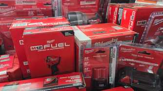 Pile of Milwaukee tools and boxes