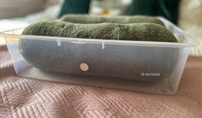 A storage bin with an NFC tag stuck to the outside of it.