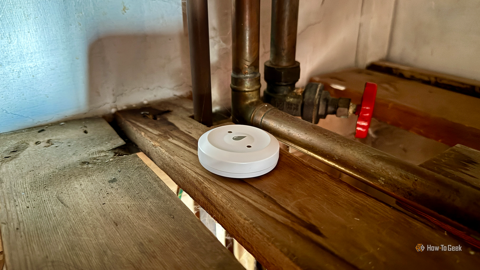A water leak sensor in a utility closet.