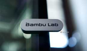 Bambu Lab logo on a P2S printer.