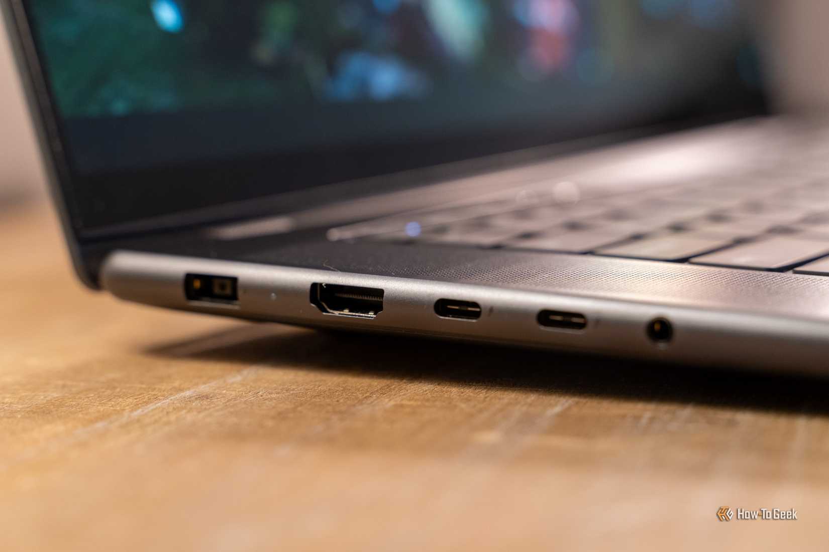 Lenovo Yoga Pro 9i Aura Edition Gen 11 side ports with USB-A HDMI USB-C and headphone jack.