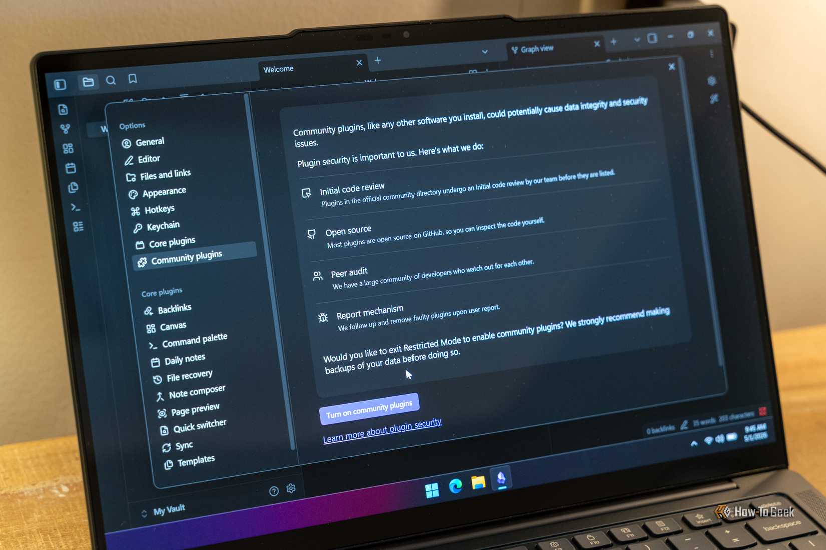 Obsidian settings showing the Community plugins security screen on a Windows laptop.