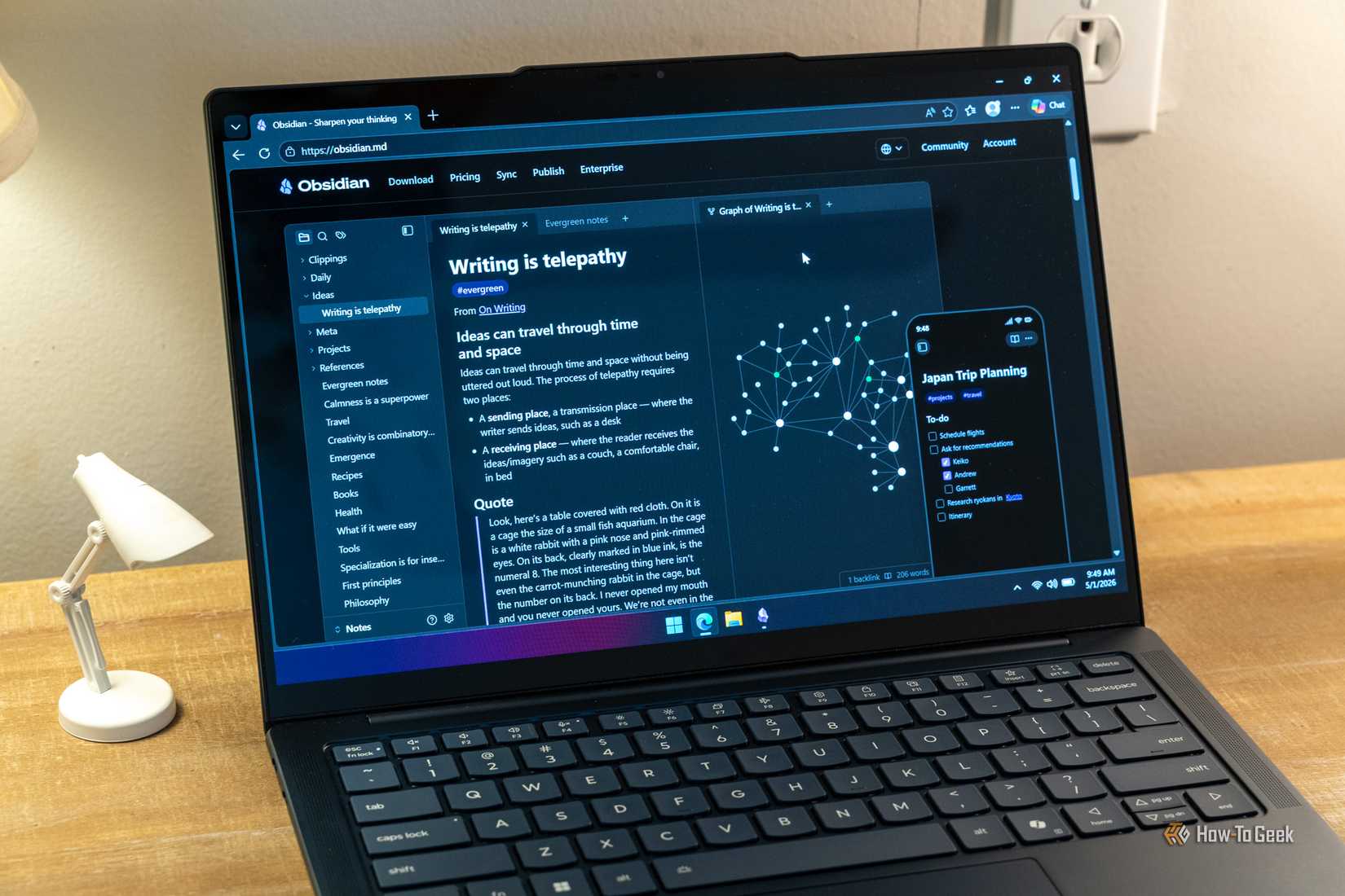 The home page of the Obsidian website is displayed on a Windows laptop with a preview graphic of the program.