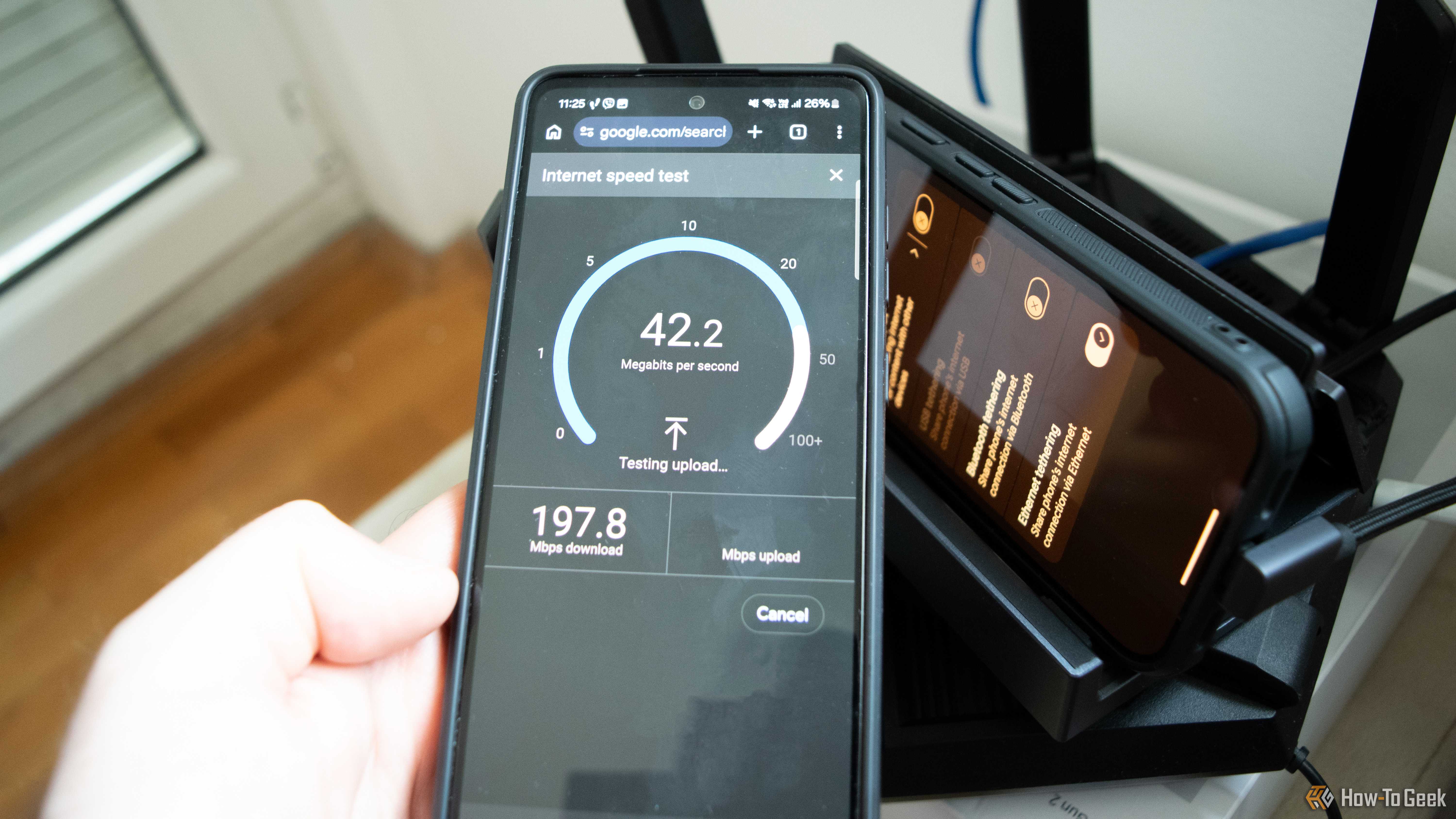 Performing internet speed test on a Samsung Galaxy A52S and getting 197.8 as high demand and 42.2 in main test.
