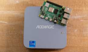 Raspberry Pi 4B sitting on top of the ACEMAGIC M5 mini PC for size comparison.